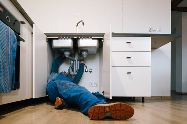 Professional Drain Cleaning technician working in Greenville, NC
